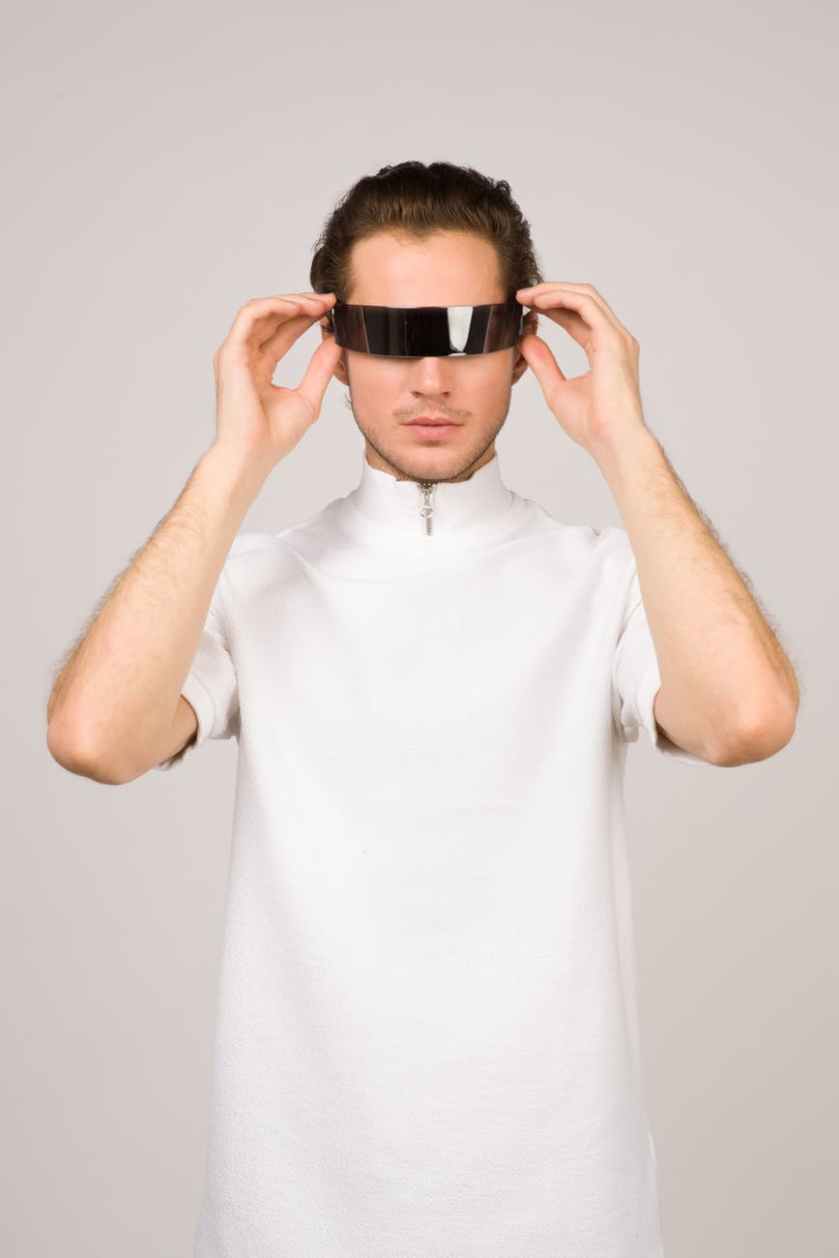 man wearing white turtle neck t shirt