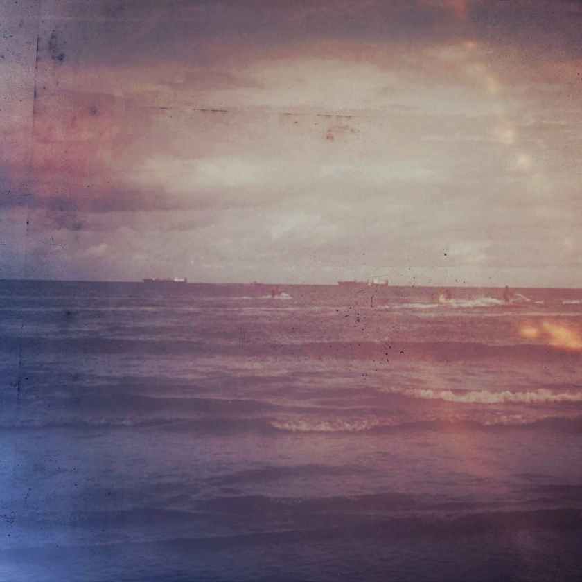 body of water during sunset